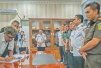 Foto : Wali Kota Kotamobagu, Weny Gaib bersama forkopimda 