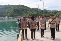Foto : Polres Boalemo Gelar Upacara Tabur Bunga di Pelabuhan Tilamuta Peringati HUT Bhayangkara ke-79