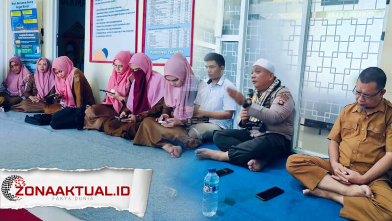 Foto : IPDA Oyong Ajak ASN Puskesmas Tilamuta Giat Bersedekah Lewat Majelis Taklim