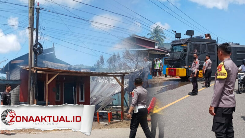 Foto : pihak emadan kebakaran dan kepolisian berusaha memadamkan api 