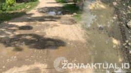 Foto : Jalan Rusak di Desa Kuala Lumpur, Kecamatan Paguyaman, Kabupaten Boalemo 