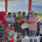 Foto : Mikson Yapanto Salurkan Bantuan Rawan Pangan Rp800 Juta untuk Warga Popayato dan Paguyaman Pantai