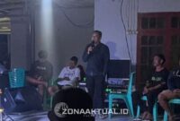 Foto : Anggota DPRD Kabupaten Boalemo, Arman Naway, menghadiri undangan masyarakat tani Desa Mutiara, Kecamatan Paguyaman, dalam kegiatan Pesta Panen, Minggu (26/10/2025).