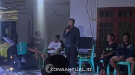 Foto : Anggota DPRD Kabupaten Boalemo, Arman Naway, menghadiri undangan masyarakat tani Desa Mutiara, Kecamatan Paguyaman, dalam kegiatan Pesta Panen, Minggu (26/10/2025).