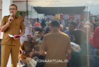 Foto : Lahmudin Hambali, S.Sos, M.SI, Wakil Bupati Boalemo saat menggelar pasar murah di Desa Pangi Boalemo
